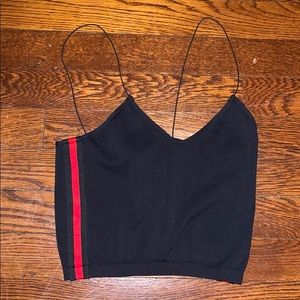 Black tank top with red stripes on sides.